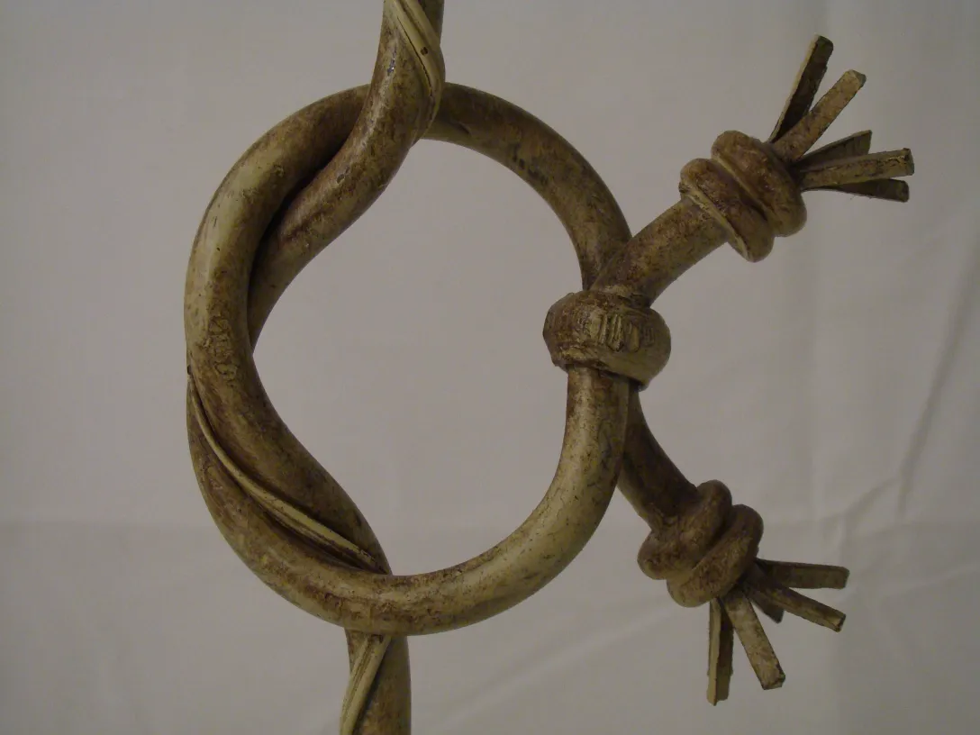 Antique table lamp with art deco design, stylized details.