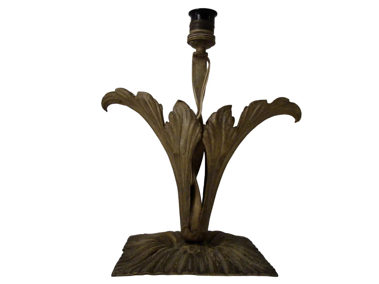 Antique table lamp with Art Deco design and decorative leaves.