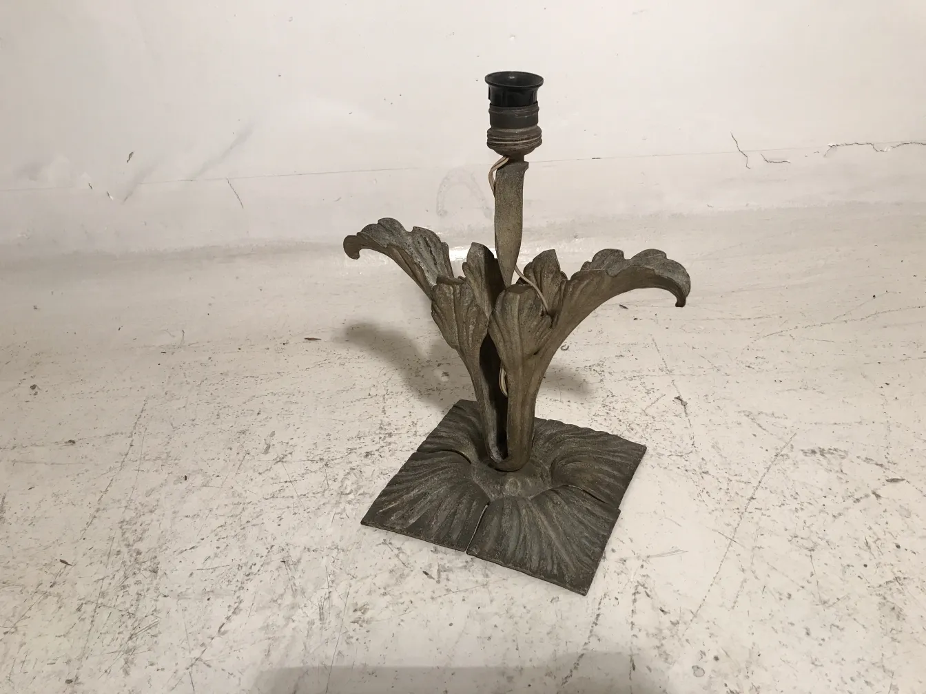 antique table lamp with decorative leaf-shaped base, art deco style