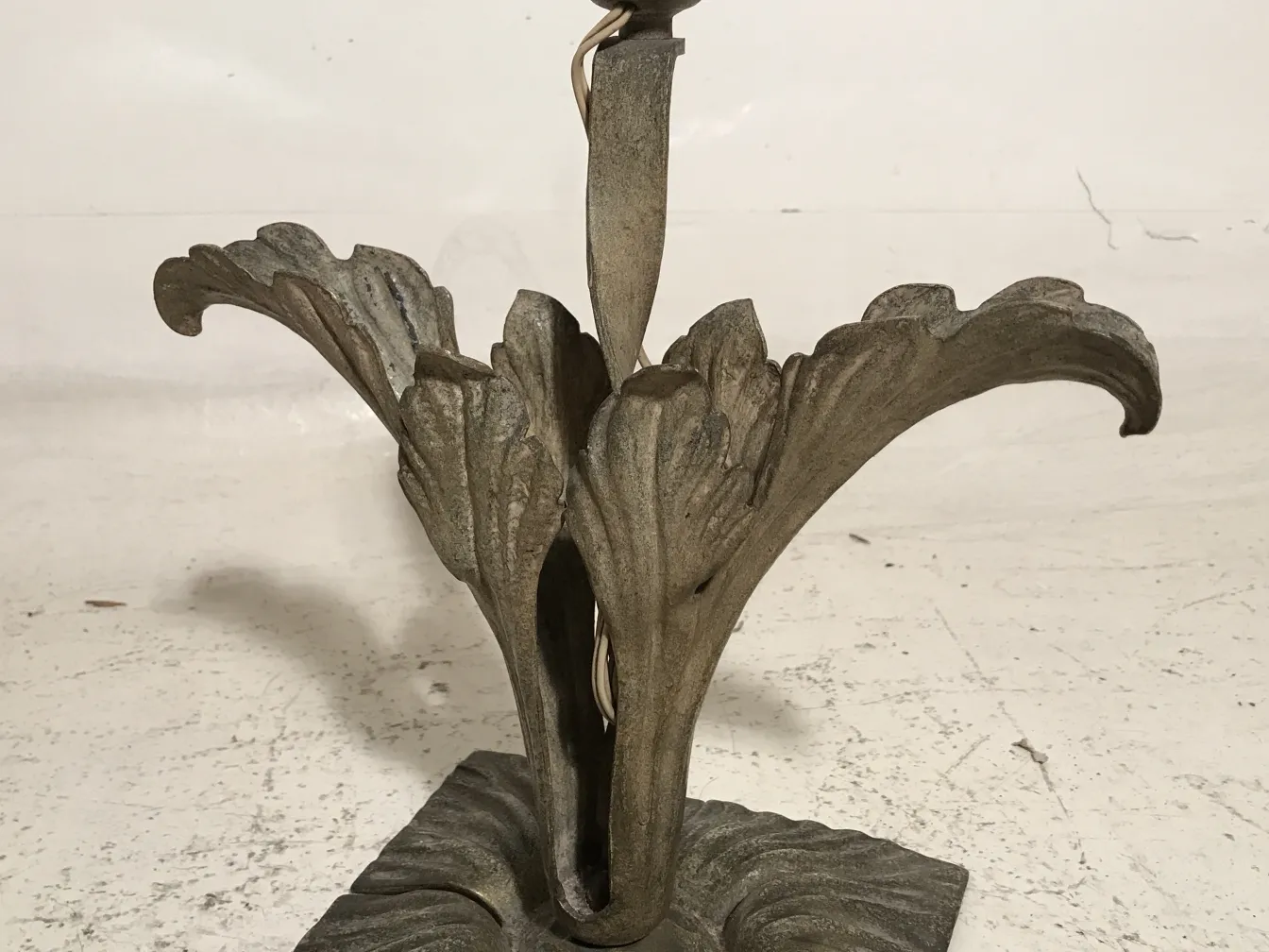 antique table lamp art deco with an ornate base and decorative details