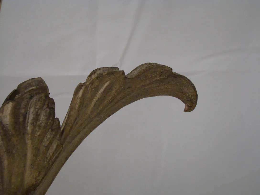 Antique table lamp in Art Deco style with decorative details.