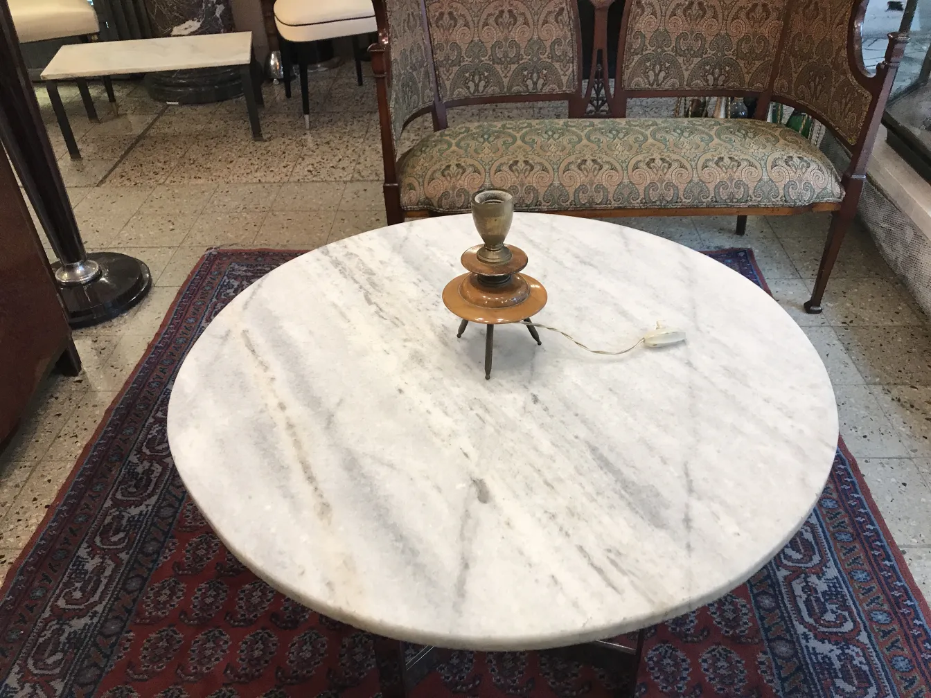 antique table lamp in art deco style on round table