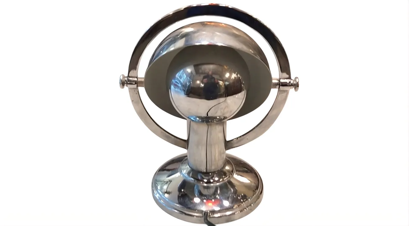 Lampe de bureau ancienne avec forme sphérique et base élégante