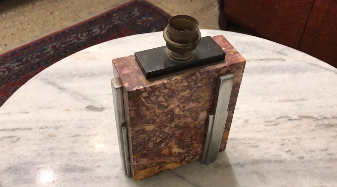 antique table lamp decorative art deco style on a marble surface