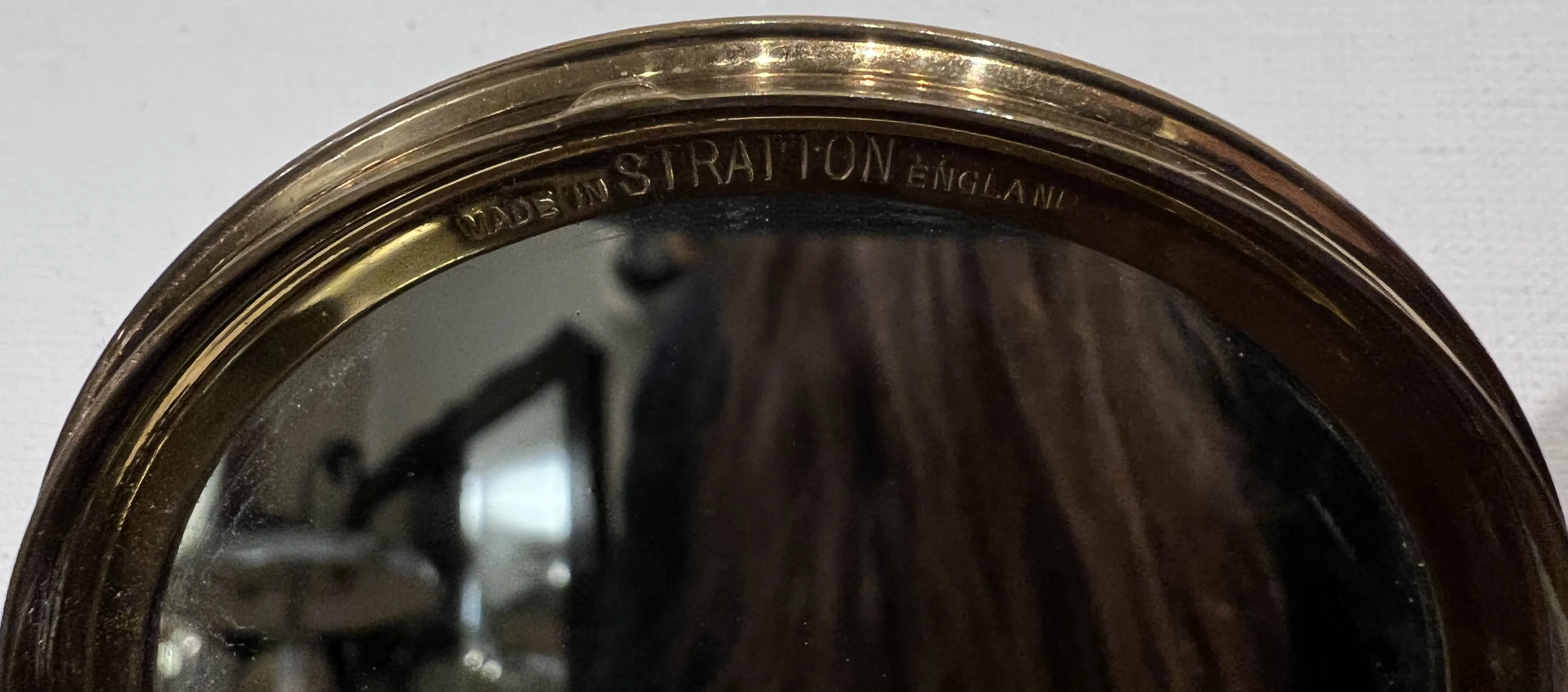 antique compact with elegant design and mirror