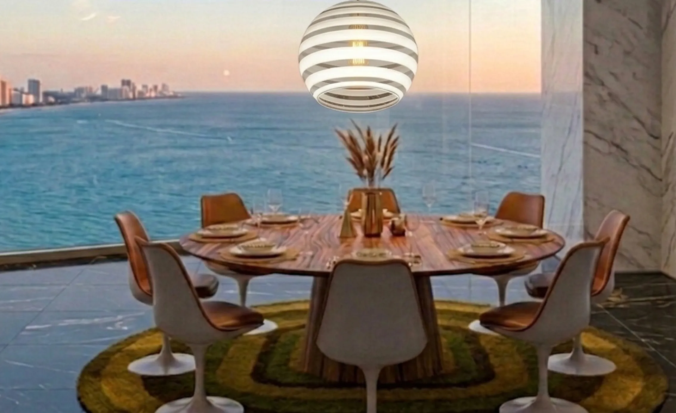 lampara de techo antigua paolo venini sobre mesa con vista al mar