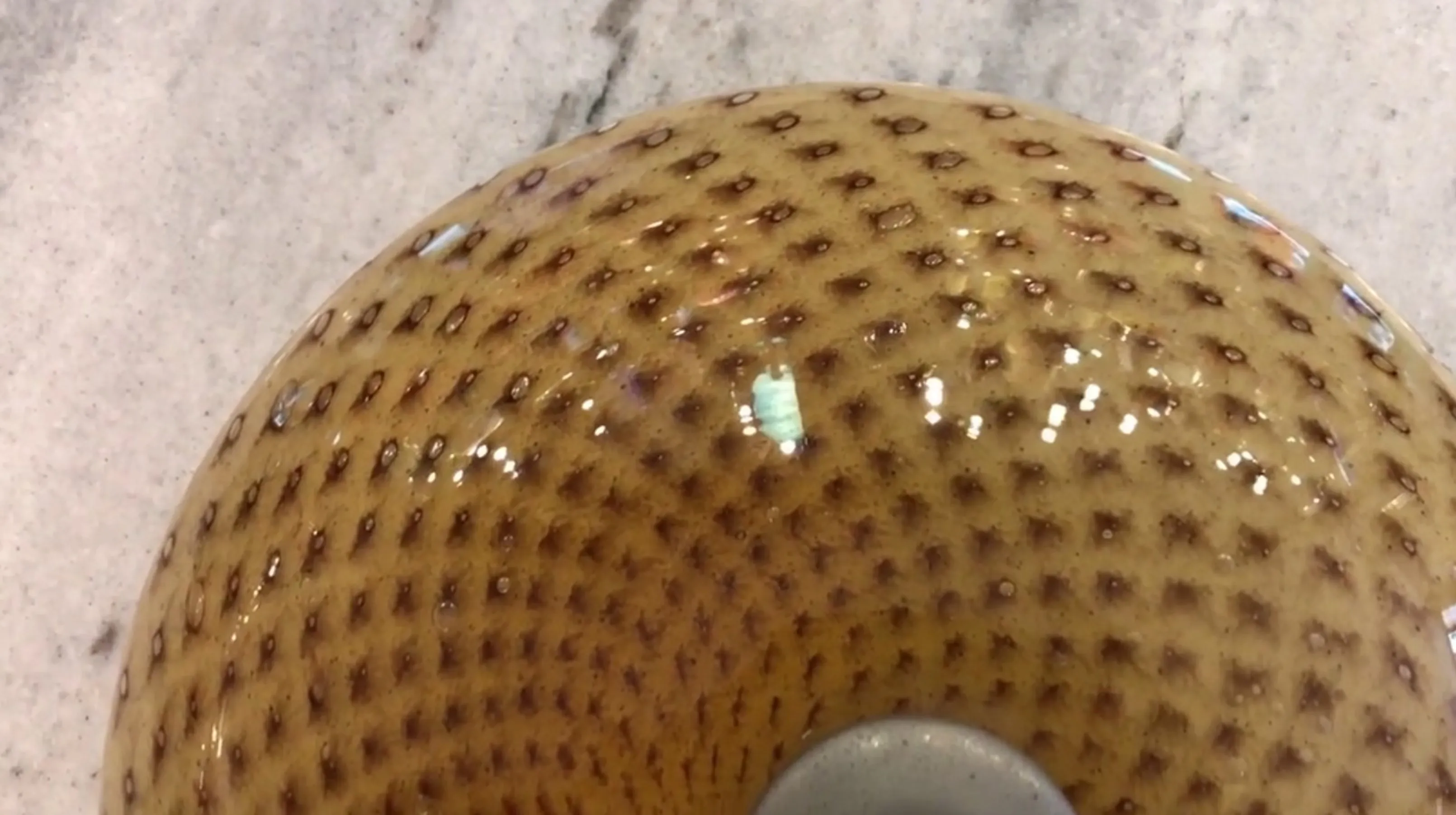 Antique ceiling light with decorative texture in light color