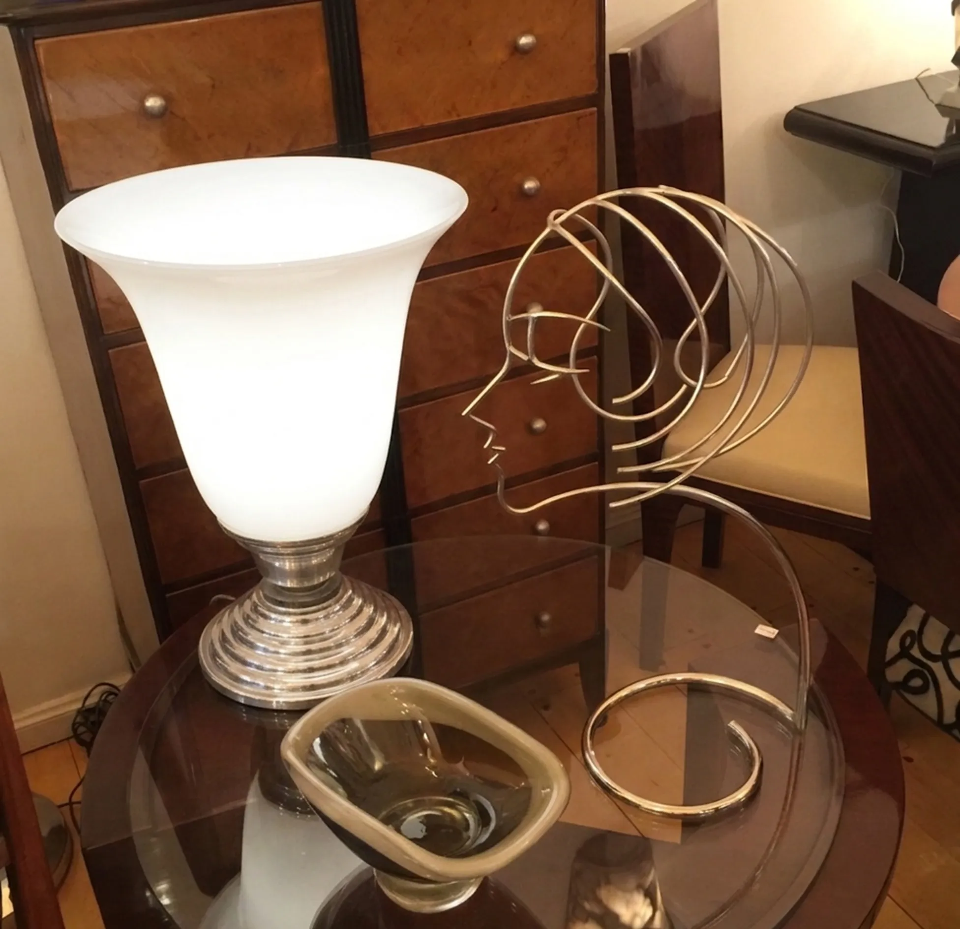 antique table lamp with silver base and unique design