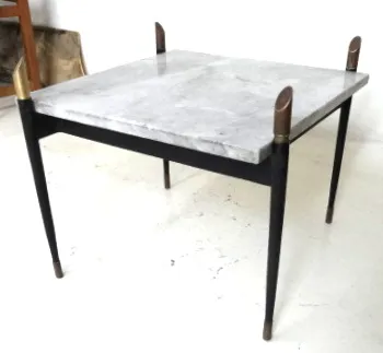 antique coffee table with clear marble top and black legs