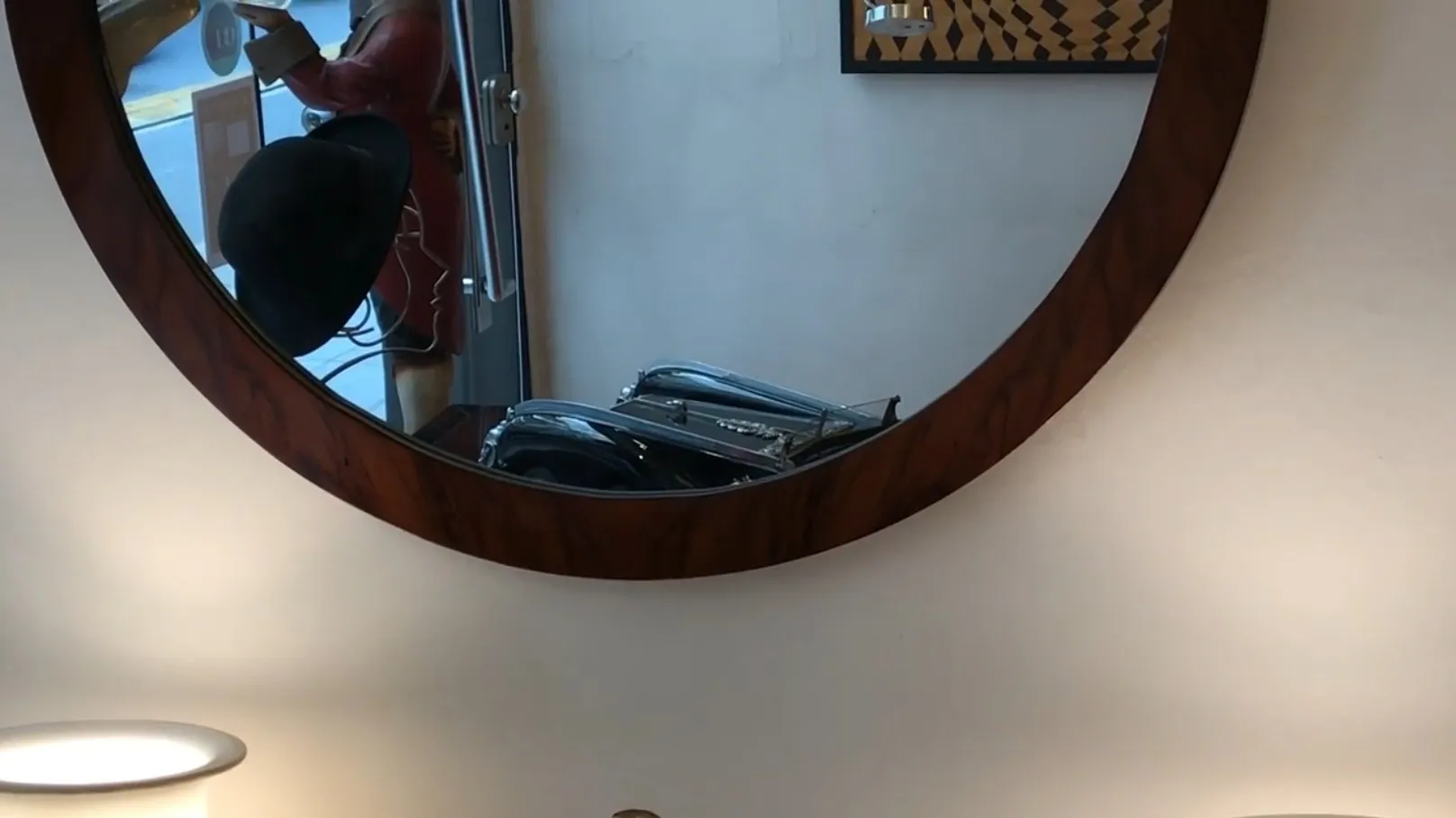 antique round mirror with visual details