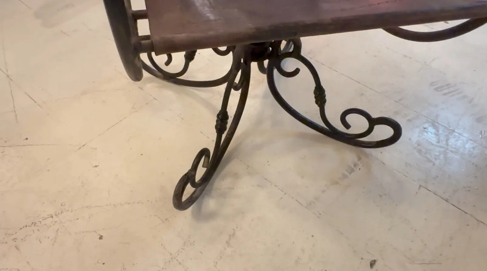 Antique armchair with an artistic base design, elegant.