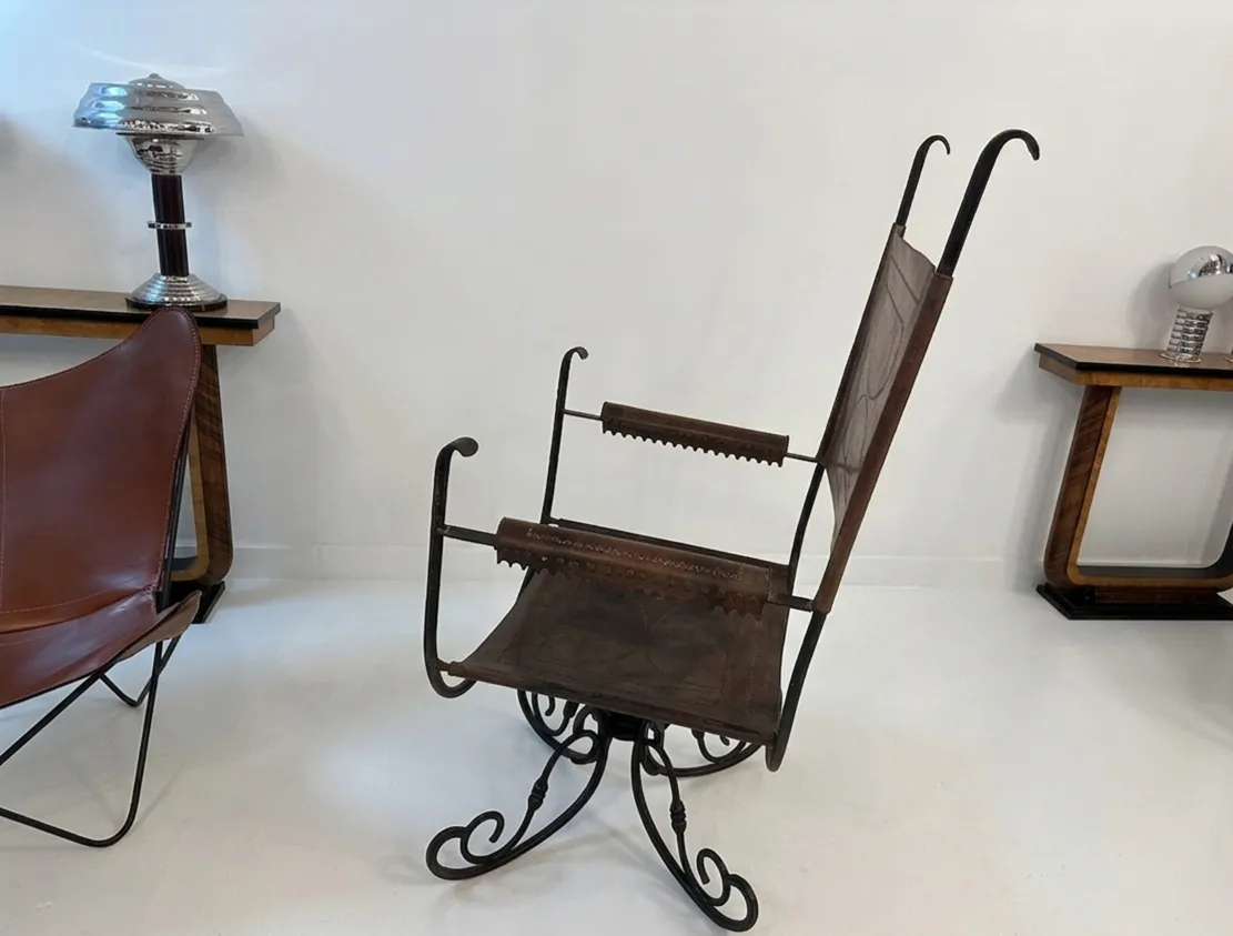 antique art deco armchair with a curvy design