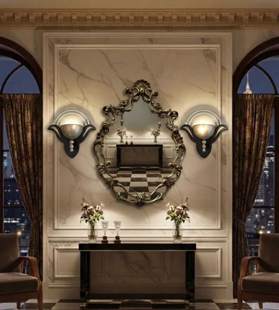 antique decorative mirror with elaborate frame in an elegant setting.