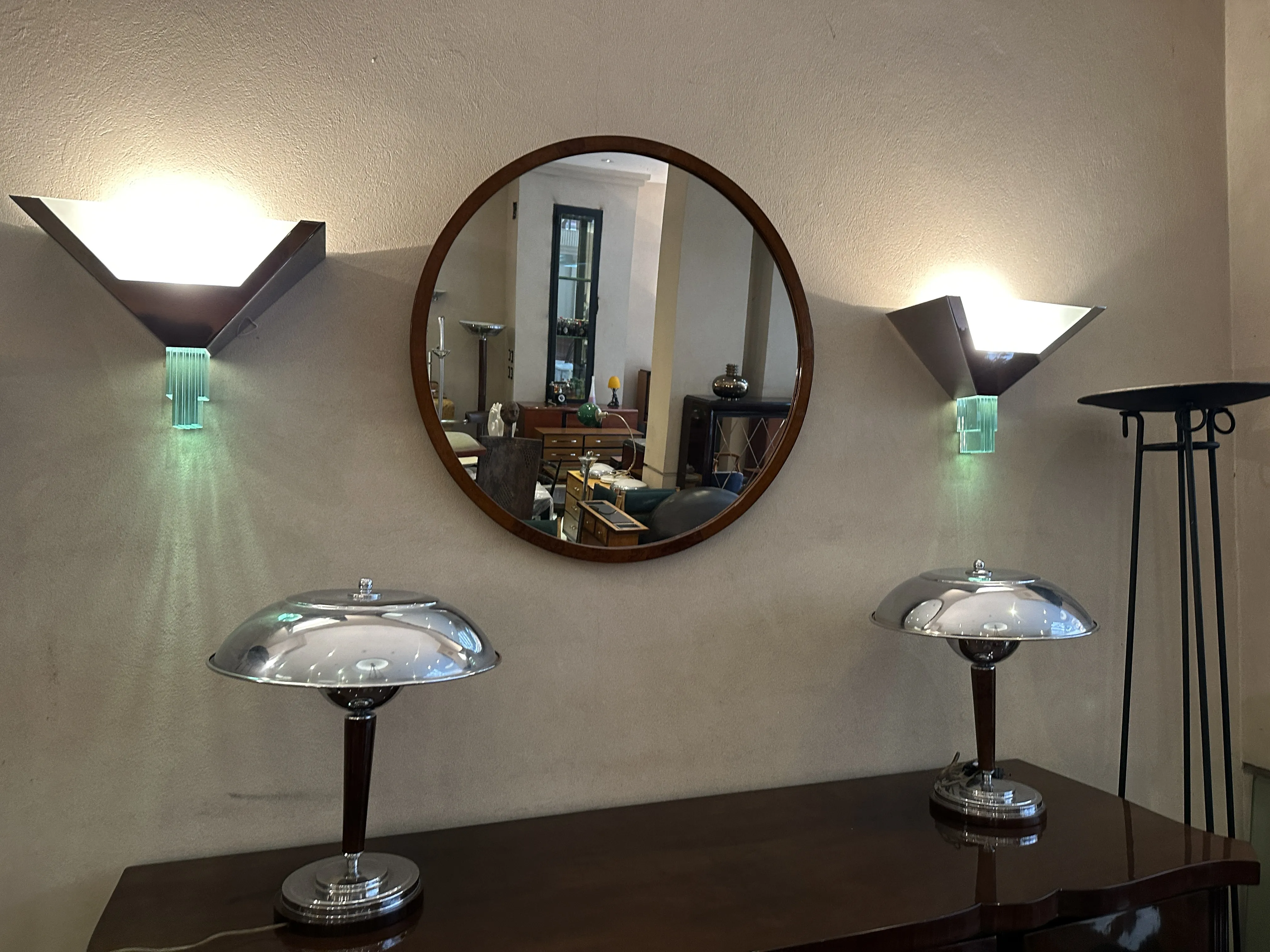 Image of 2 antique table lamps with soft light in an elegant setting