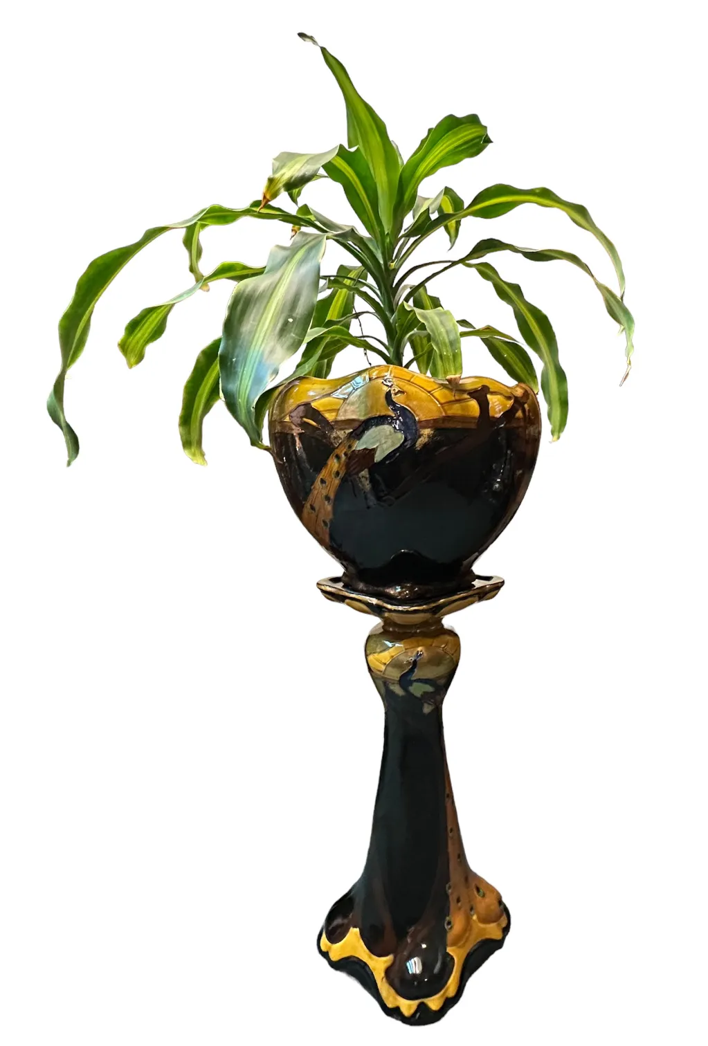 pot de fleurs ancien décoratif avec des plantes vertes et un design artistique