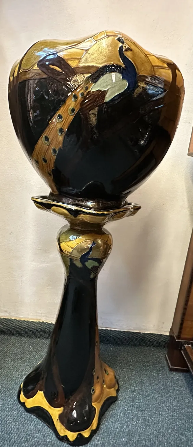 antique black and gold planter with decorative peacock, wide base
