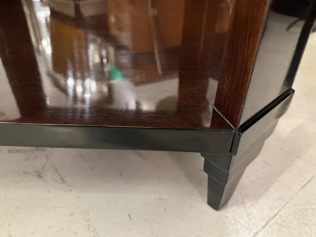 Antique coffee tables featuring elegant finishes and Art Deco design in a classic setting.