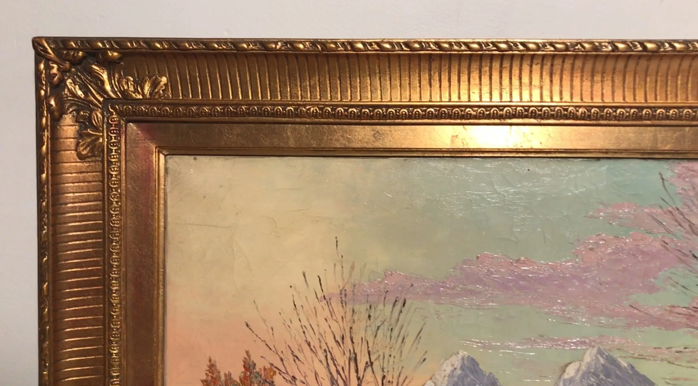 pintura antigua con paisaje de montañas y árboles