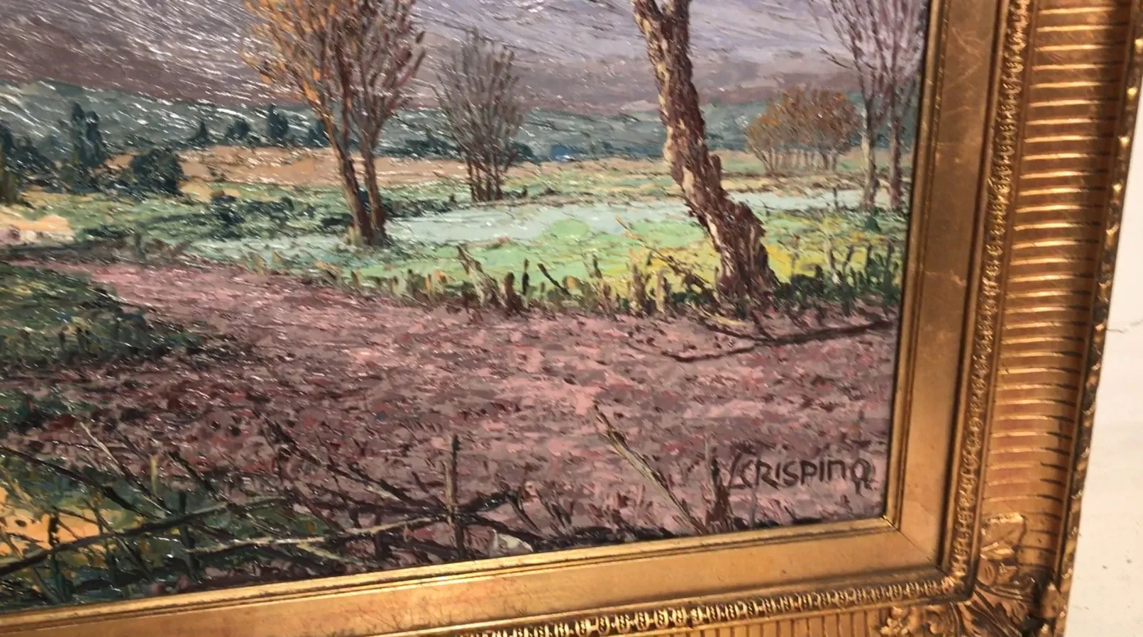 pintura antigua de paisaje con árboles y cielo gris