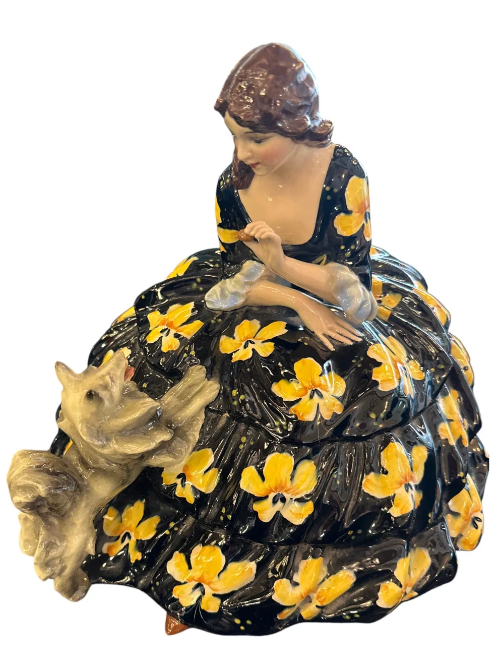Figura antigua de cerámica con mujer y animal, colorido vestido