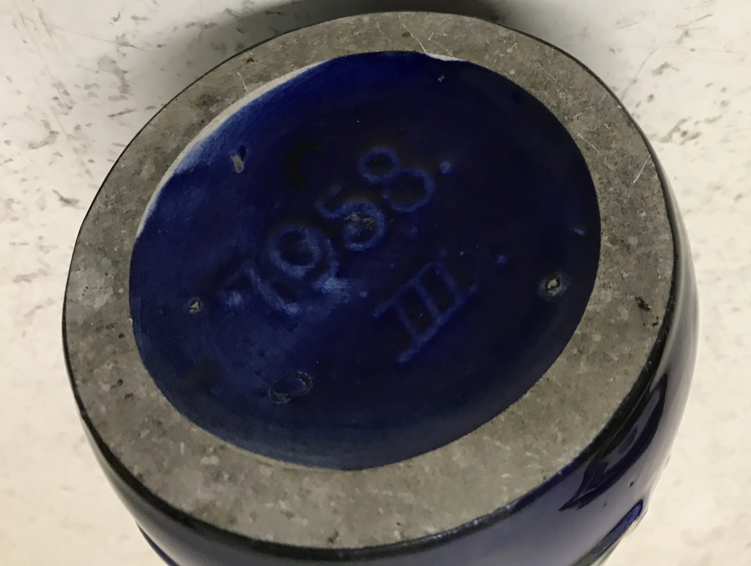 antique ceramic from Carstens Tönnieshof with distinctive blue details and rounded shape.