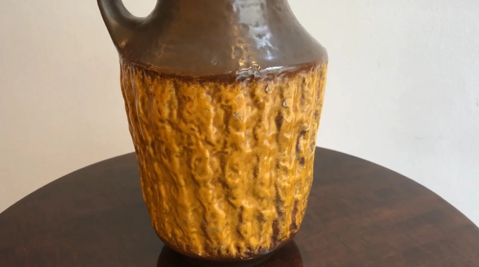 antique ceramic jug with unique texture