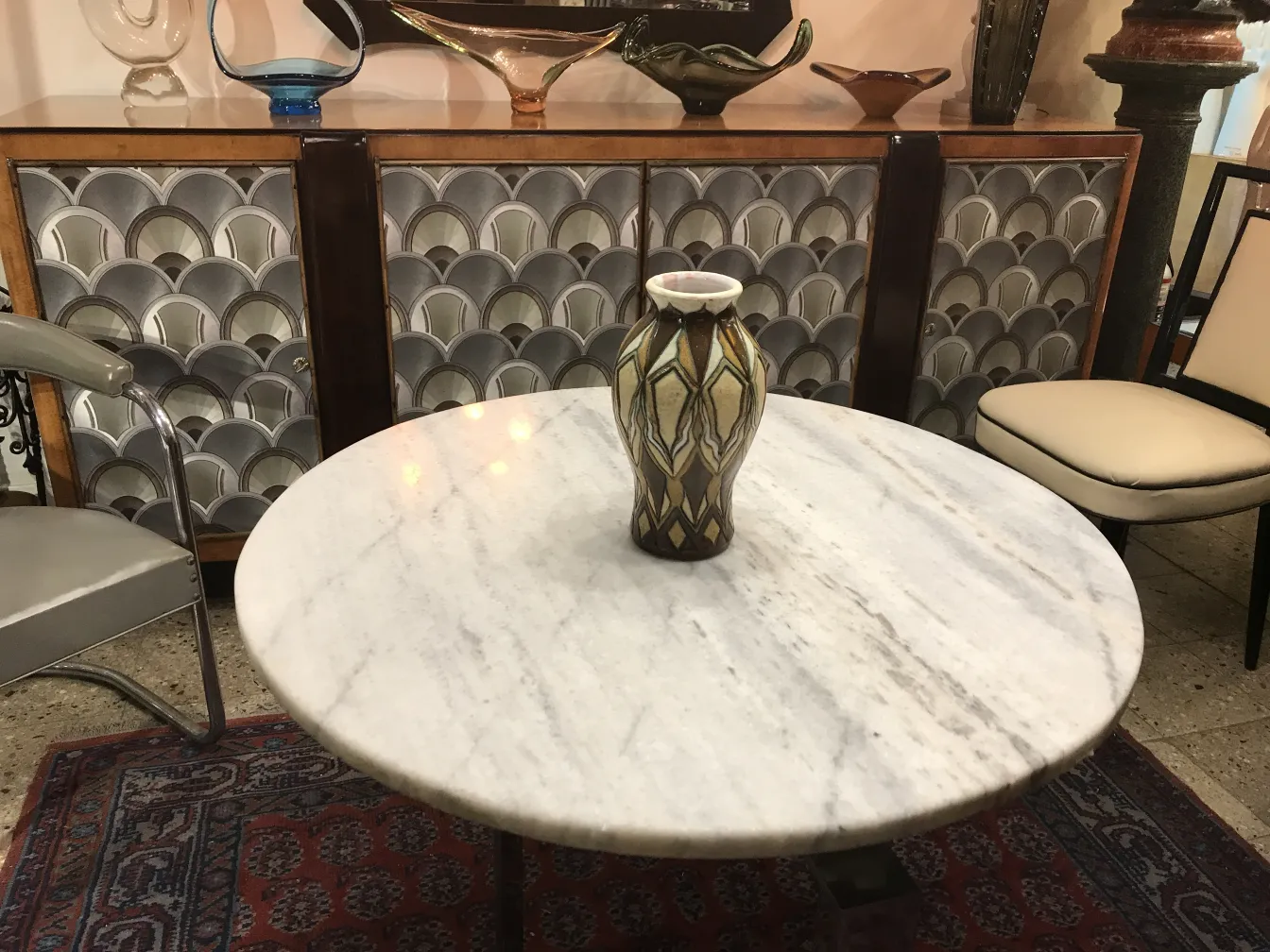 antique ceramic vase with decorative details on the table