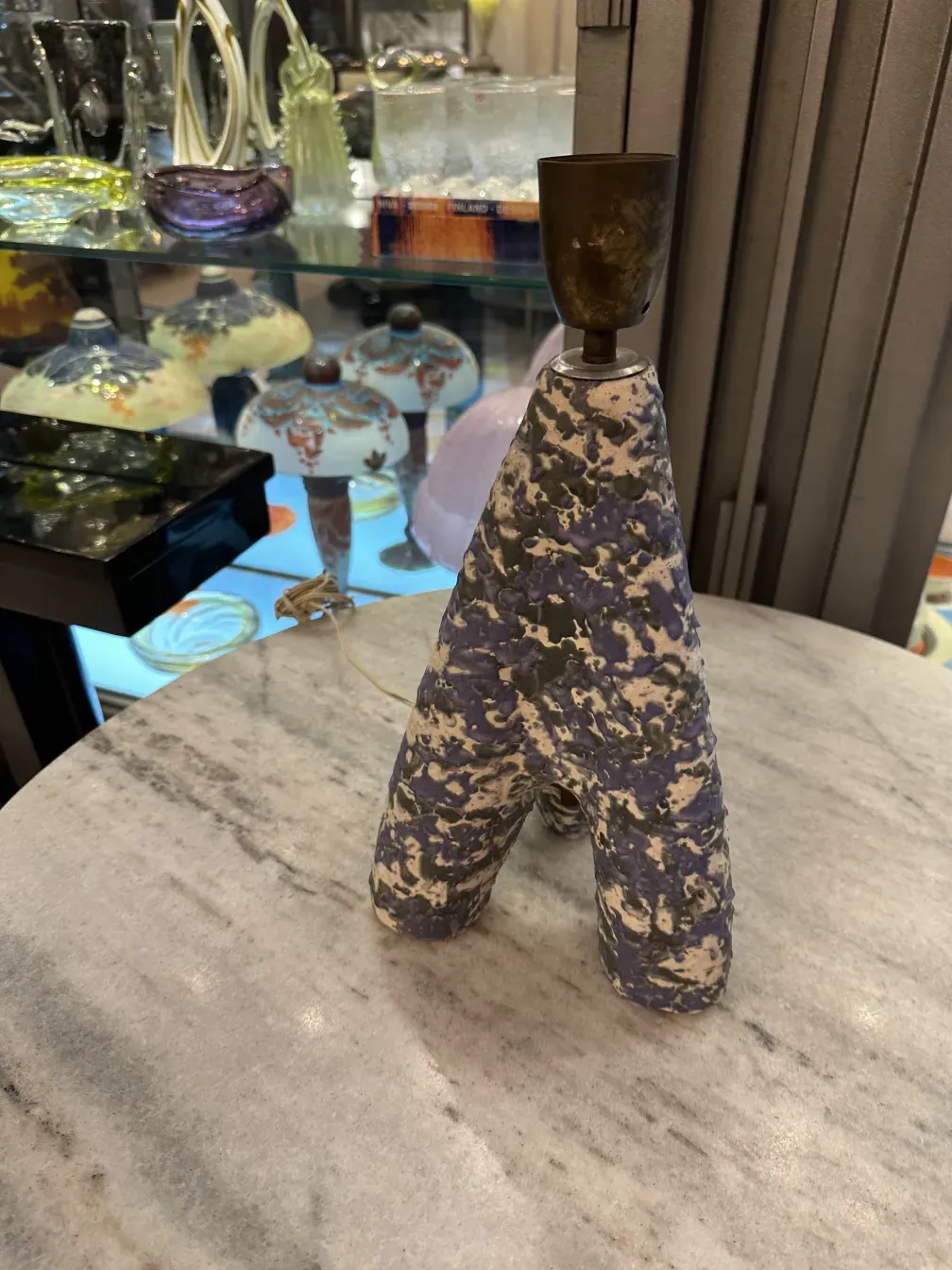 antique table lamp with decorative design and distinctive base