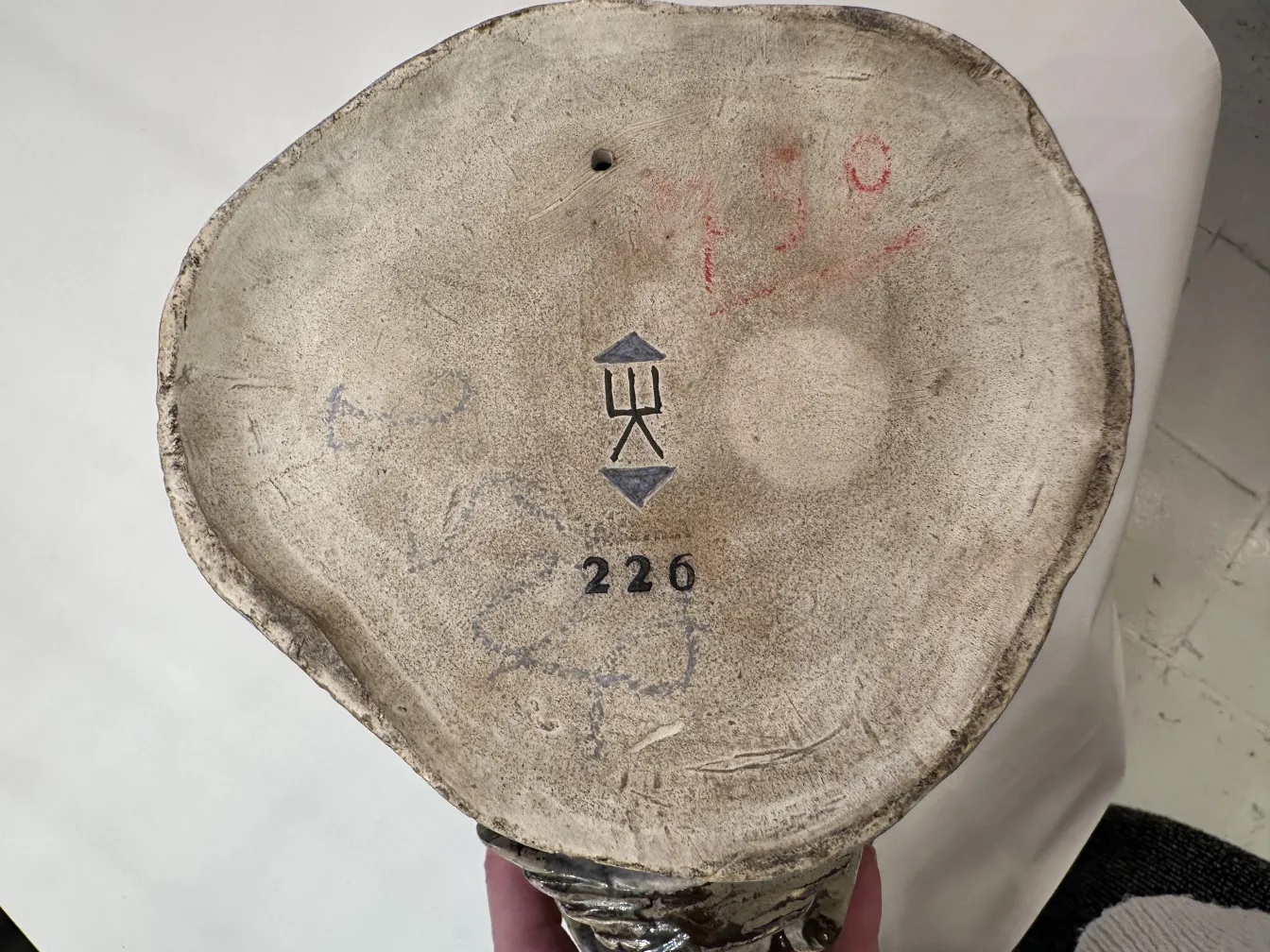 base of antique ceramic with markings