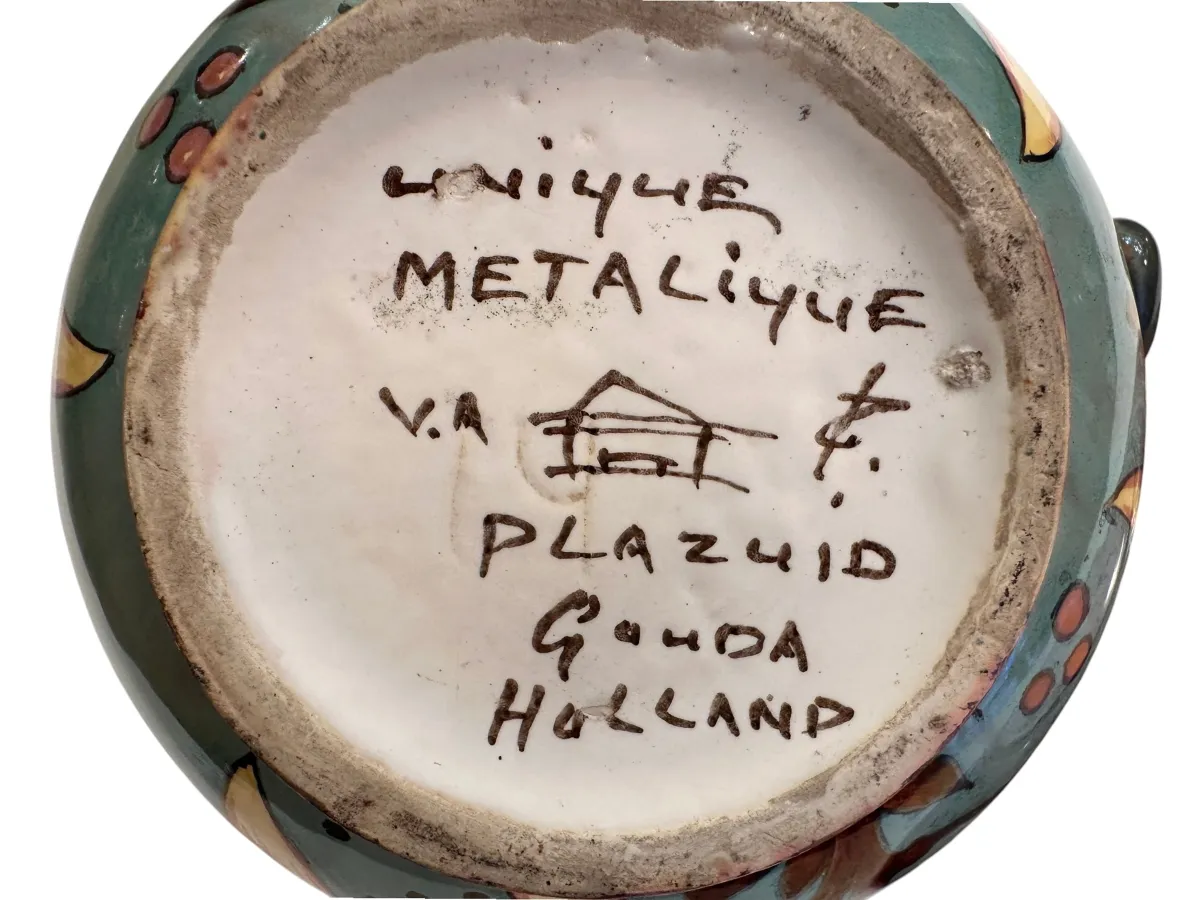 antique ceramic plate with colorful designs