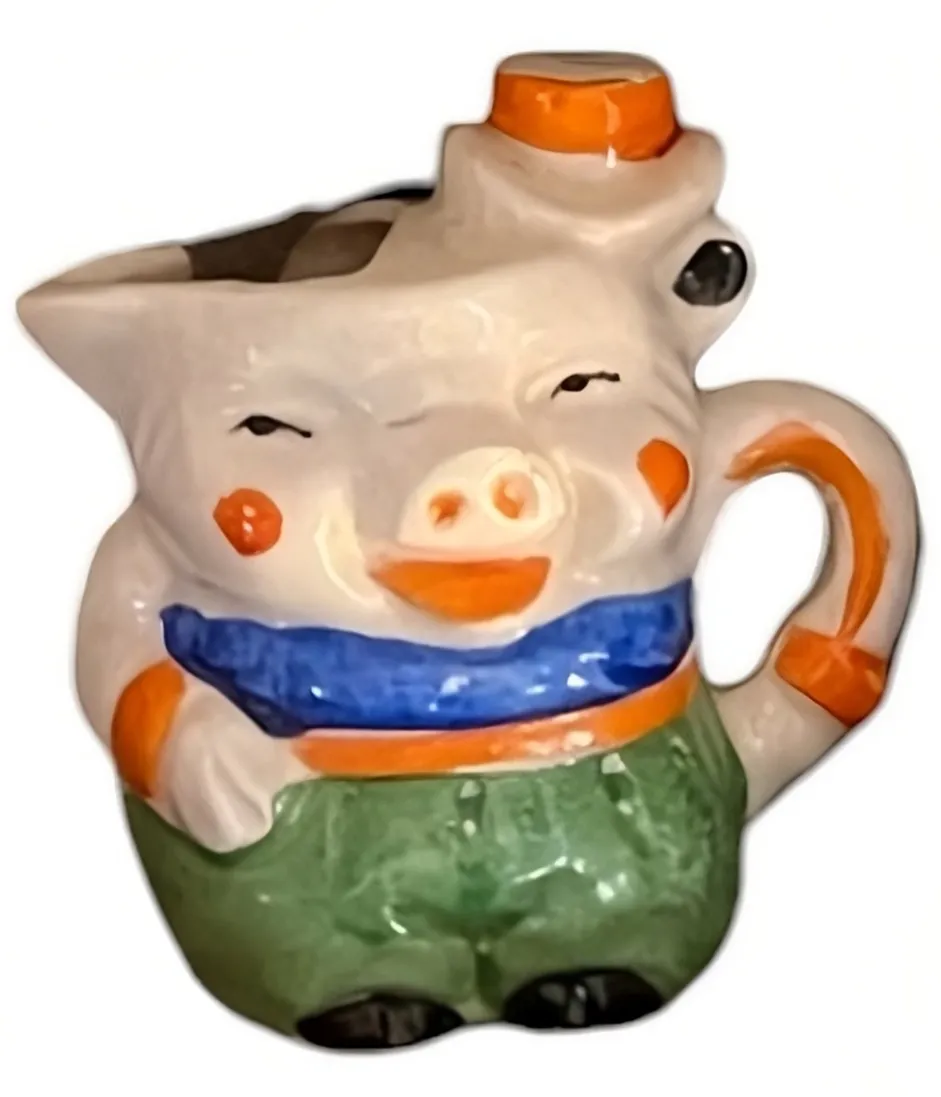 juego de té antiguo de cerámica en forma de cerdo con colores brillantes