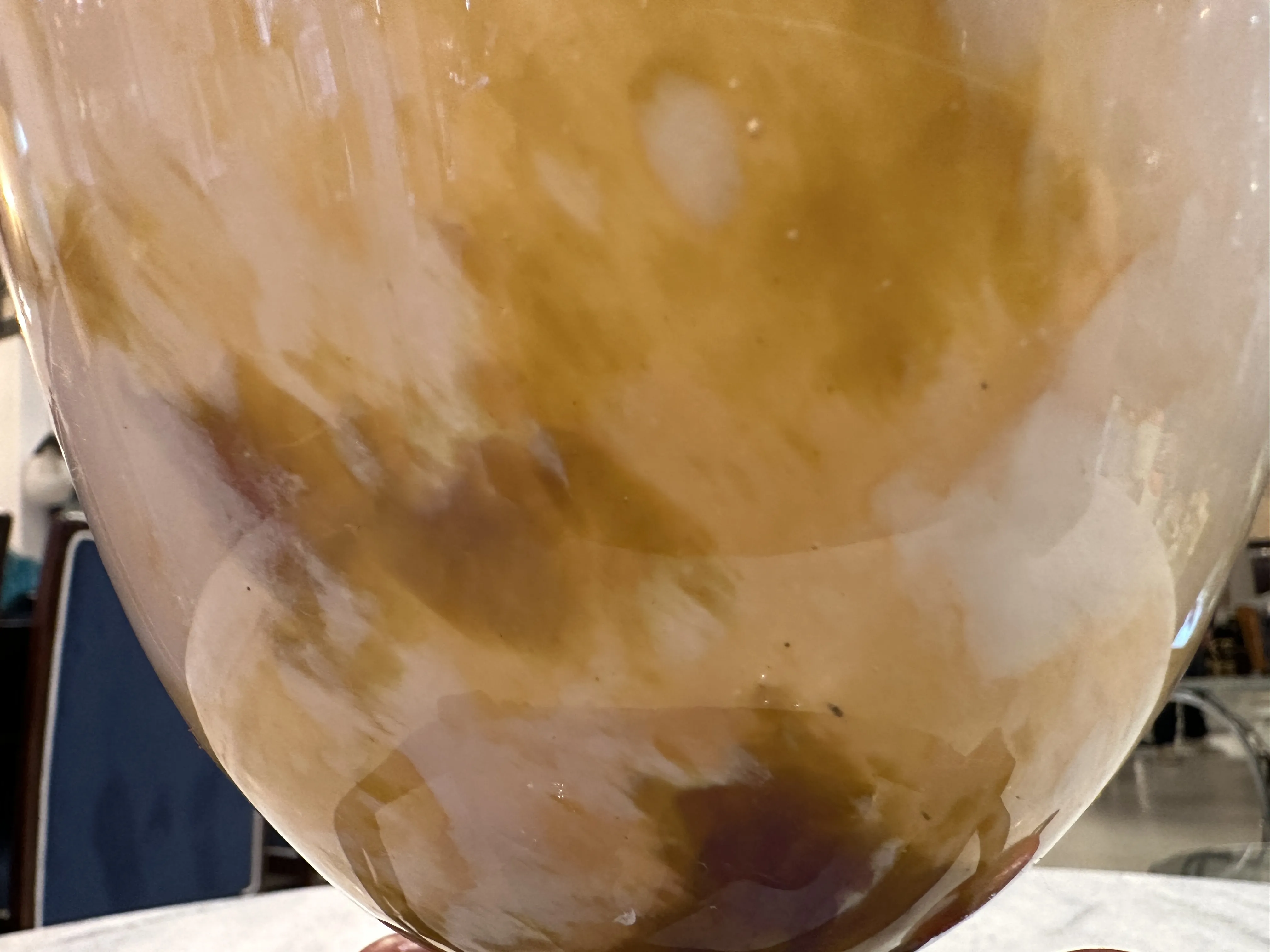 Signed glass by Schneider with abstract patterns in yellow and brown, antique