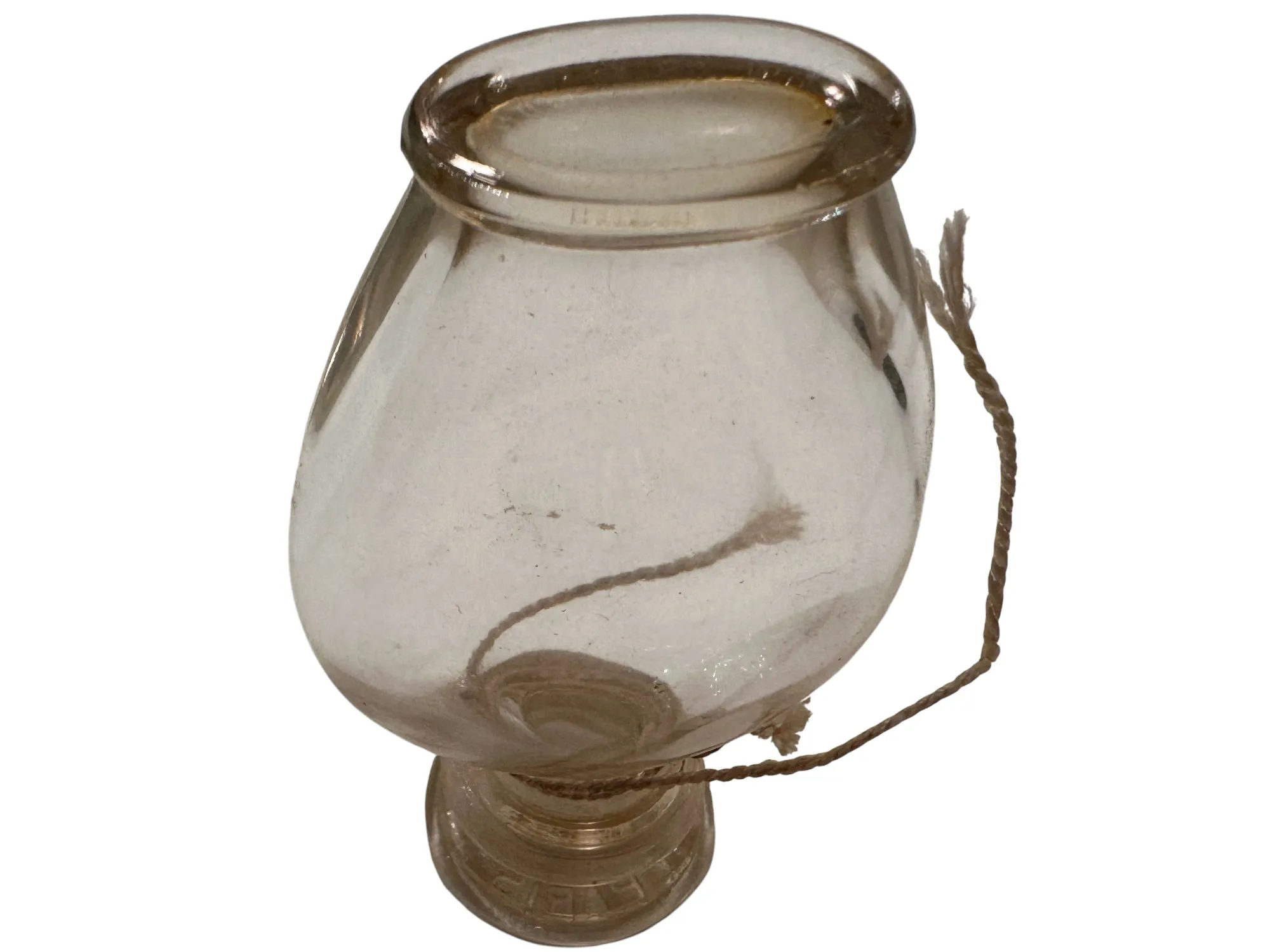frasco de perfume antigo transparente com corda