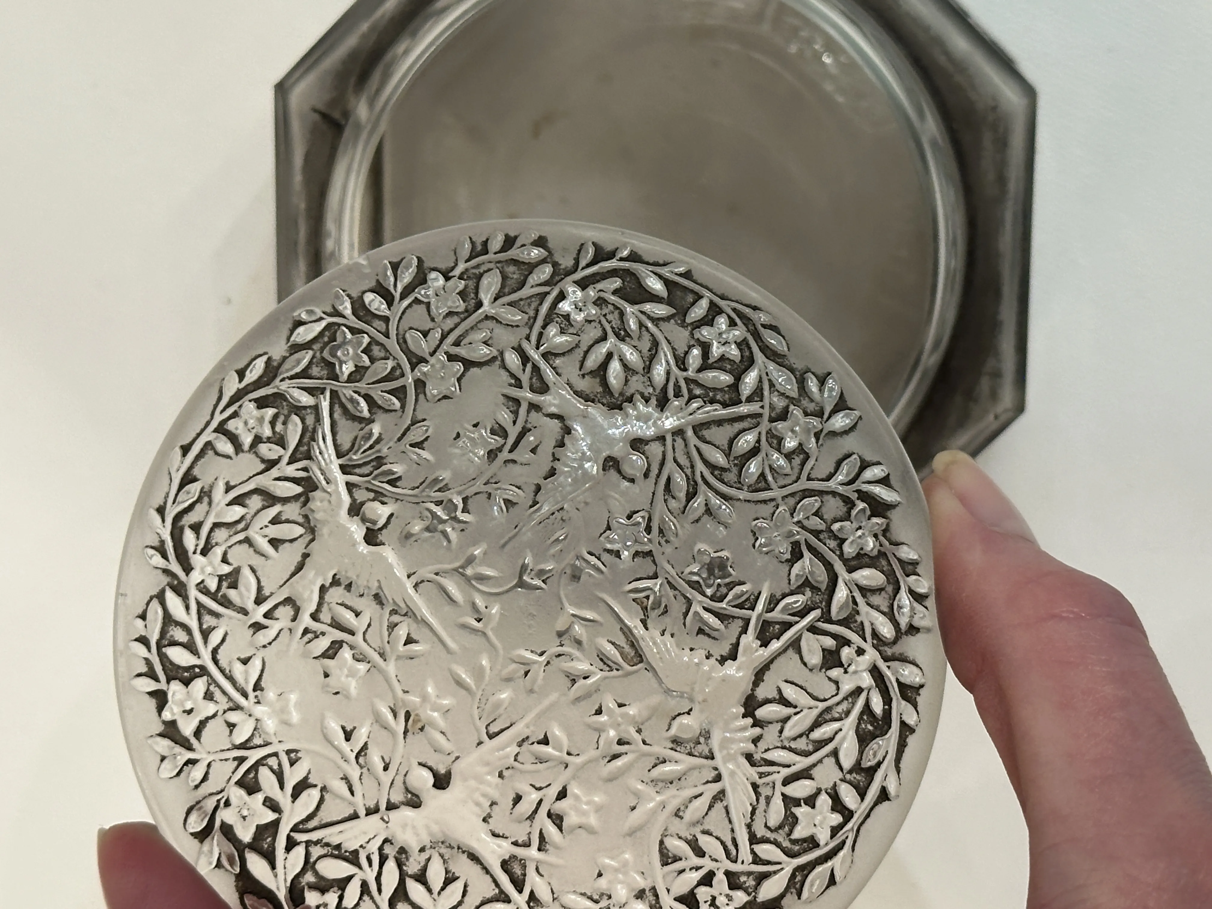 antique box with a flower and bird decorated lid