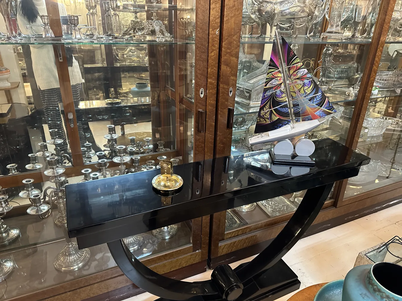 Antique WMF ashtray with decorative design and circular shape.
