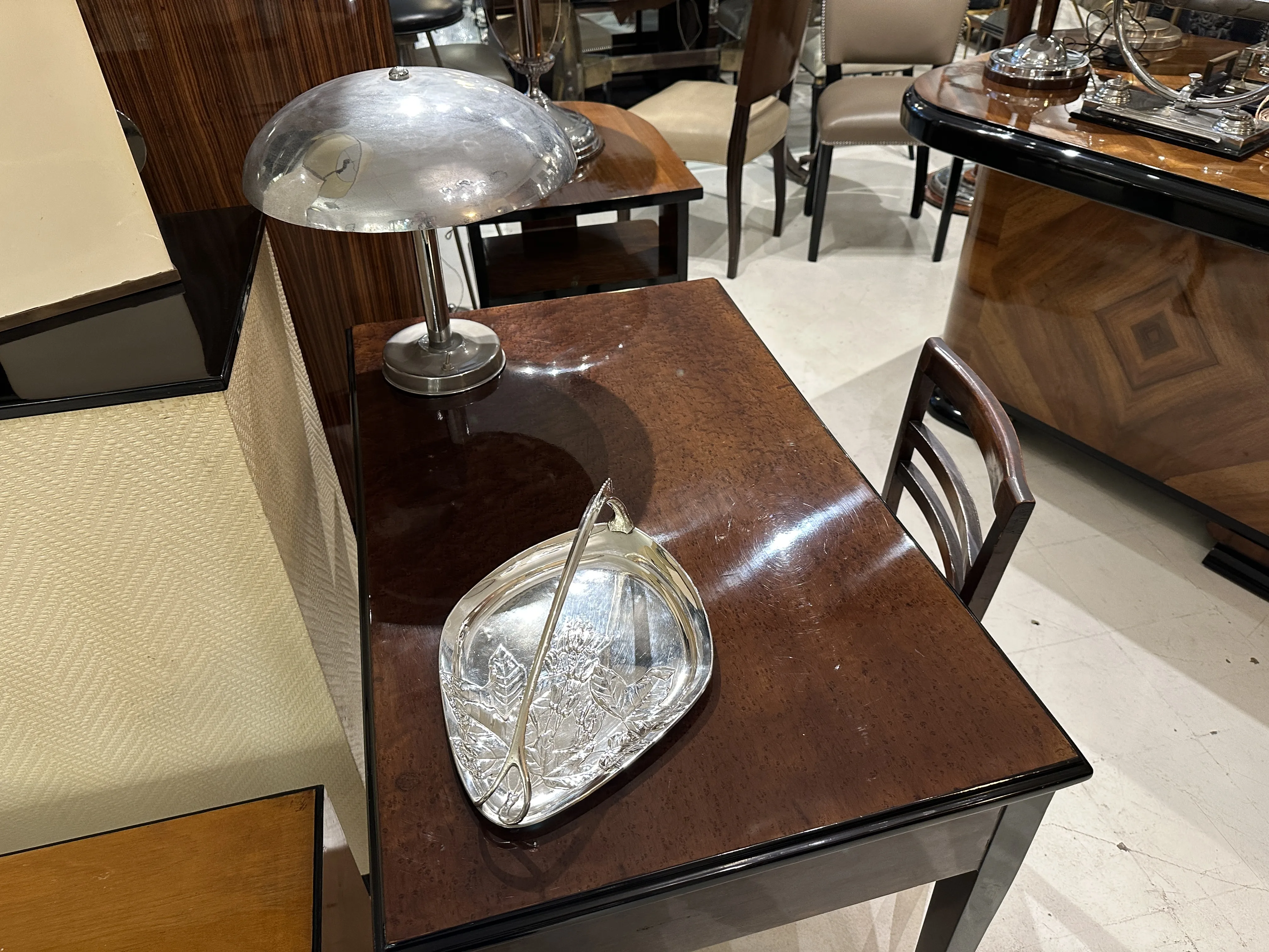 antique card tray WMF on a stylish table with lamp