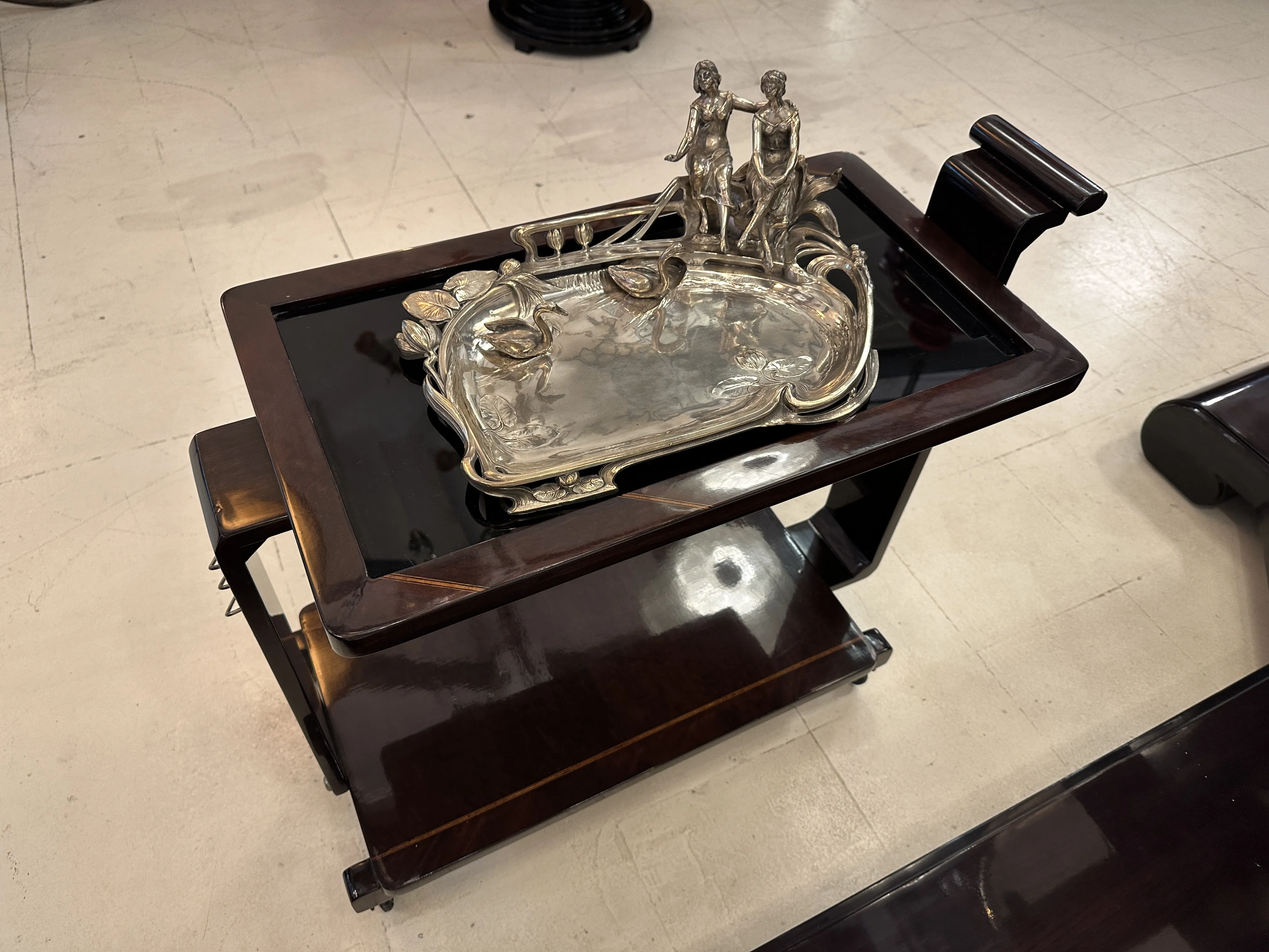 Antique WMF card tray featuring elegant design and floral decoration.