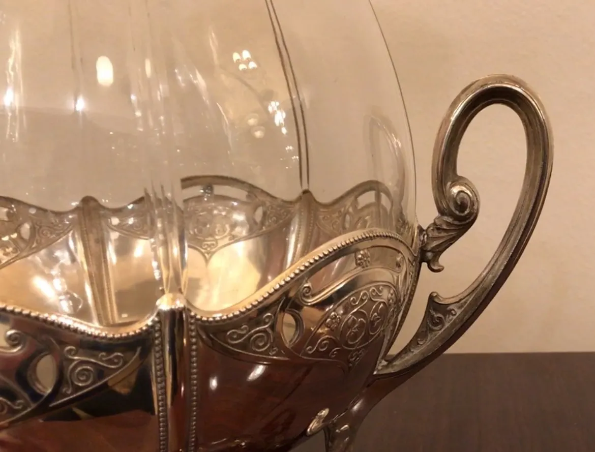 antique wmF punch bowl featuring elegant design and ornamental handles, perfect for special occasions.