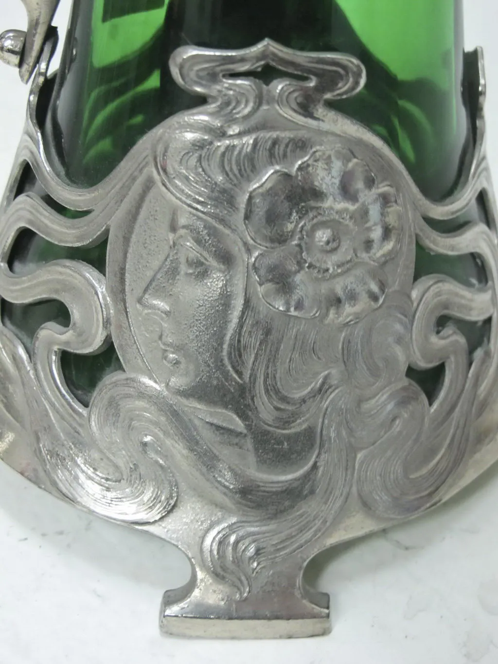 2 antique wmf jars with ornamental detail and green glass