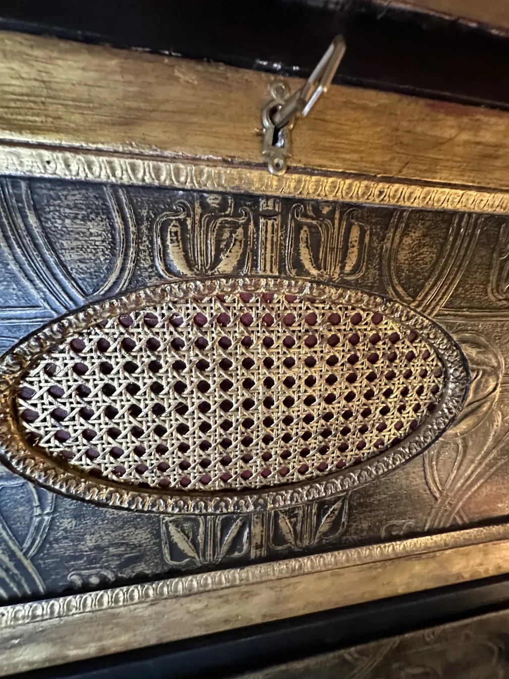 Antique bar featuring intricate gold detail and elegant design.