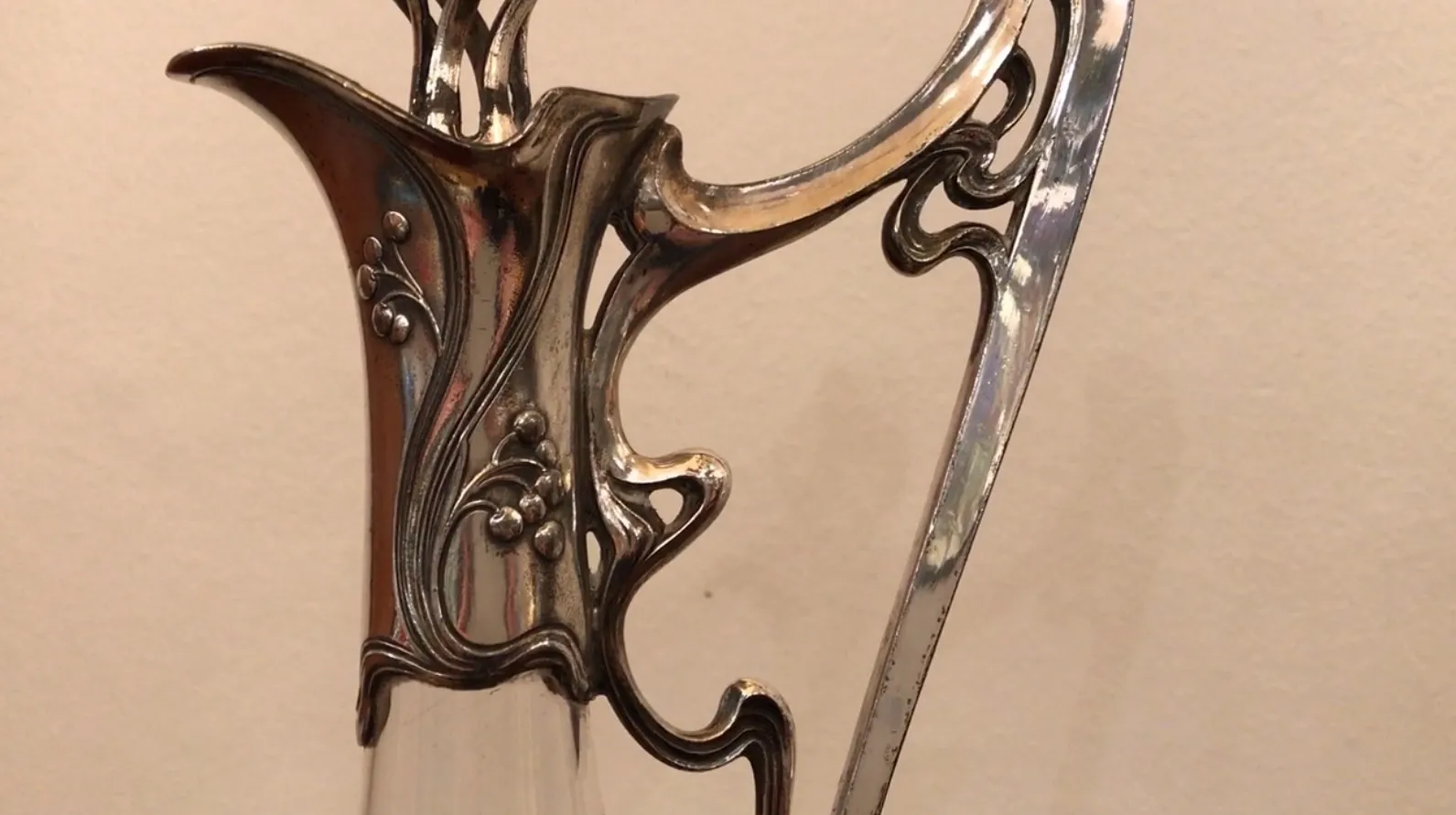 Antique jar with beautiful floral details in the design.