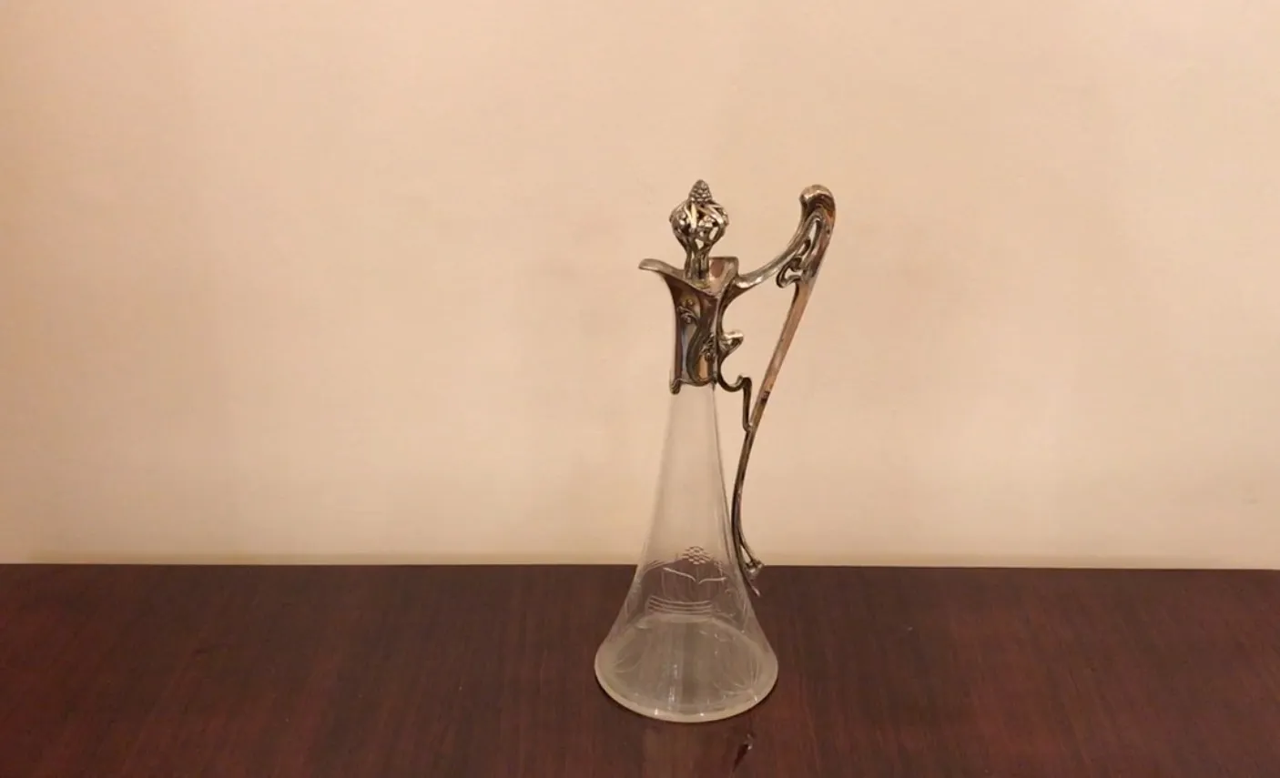 Antique jar with beautiful floral details in the design.