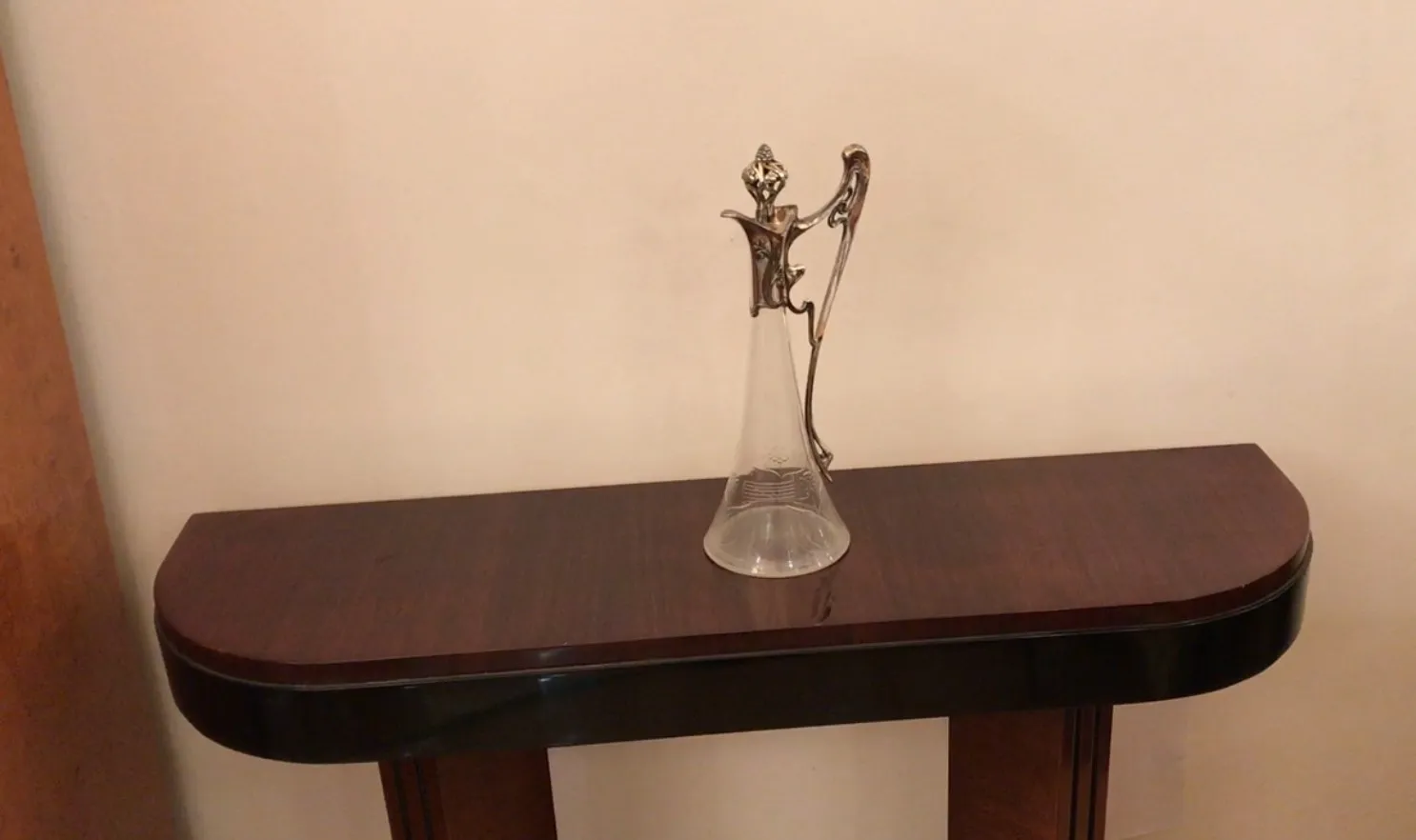 Antique jar with beautiful floral details in the design.