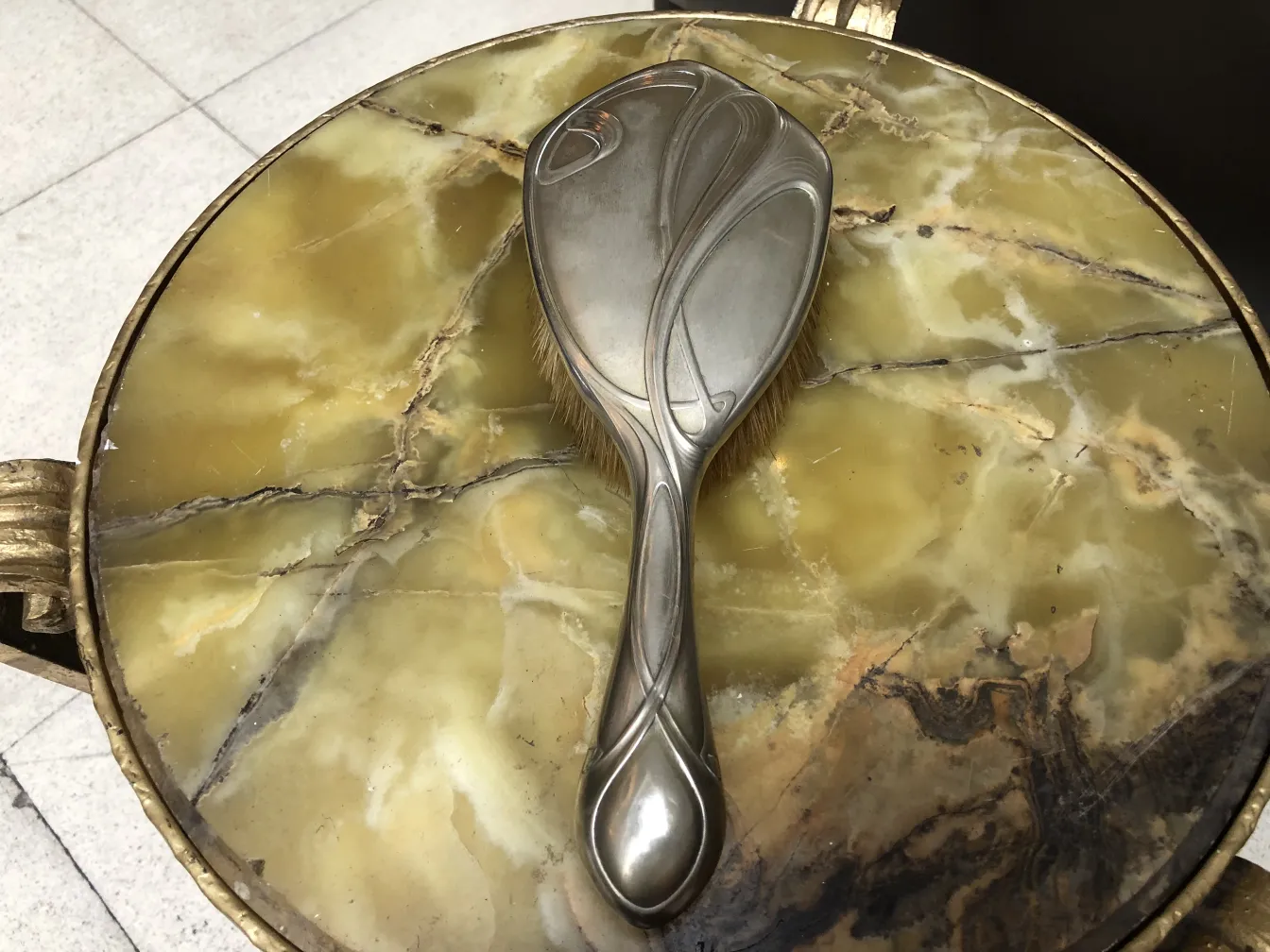 Antique hand mirror with an elegant design