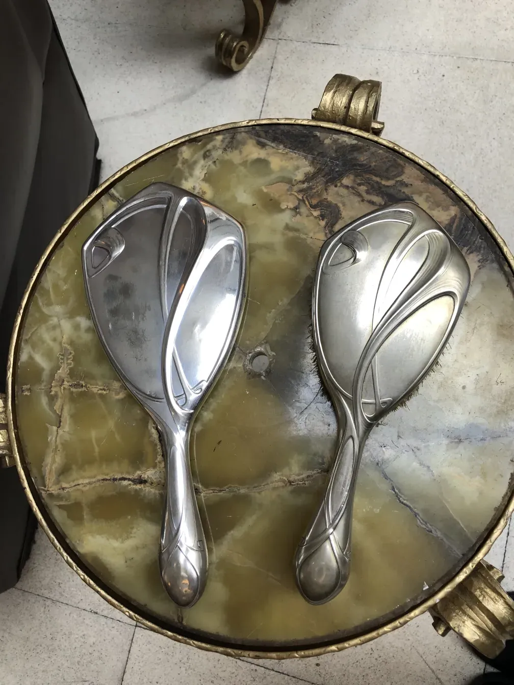 Antique hand mirror with an elegant design