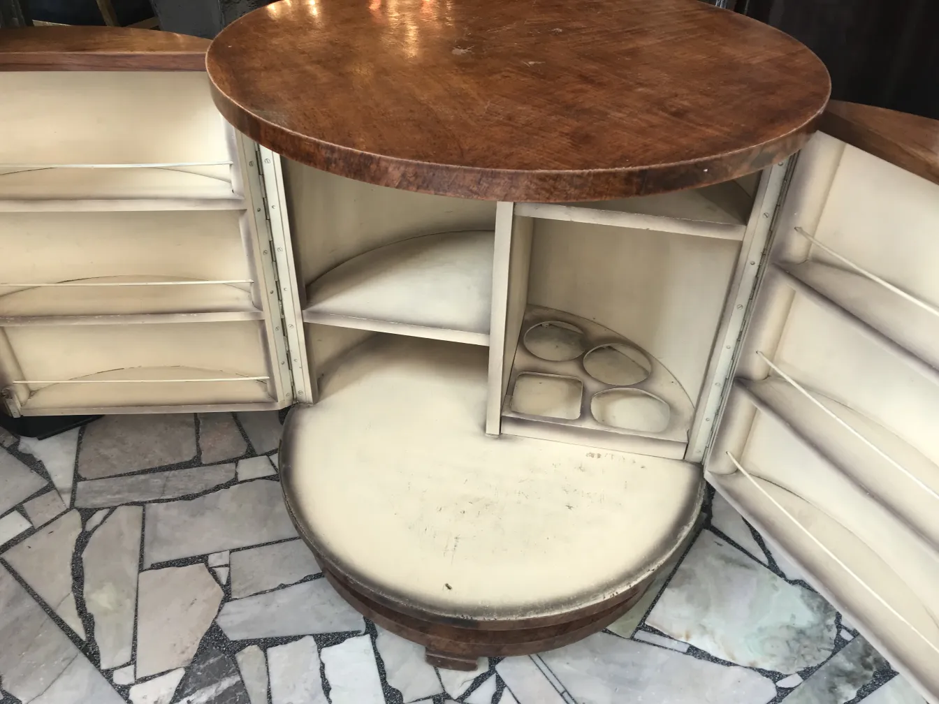 Antique round bar cabinet with internal shelves