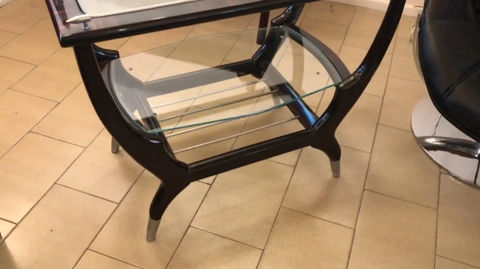 Antique bar with practical glass shelves.