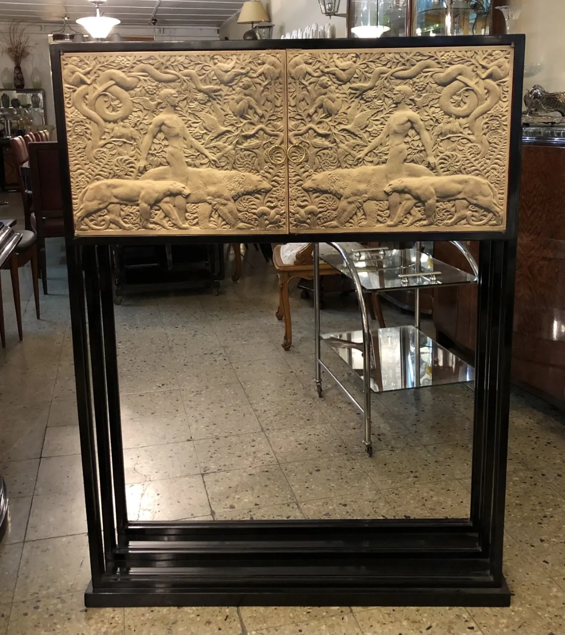 antique bookcase with decorative details and a unique design.