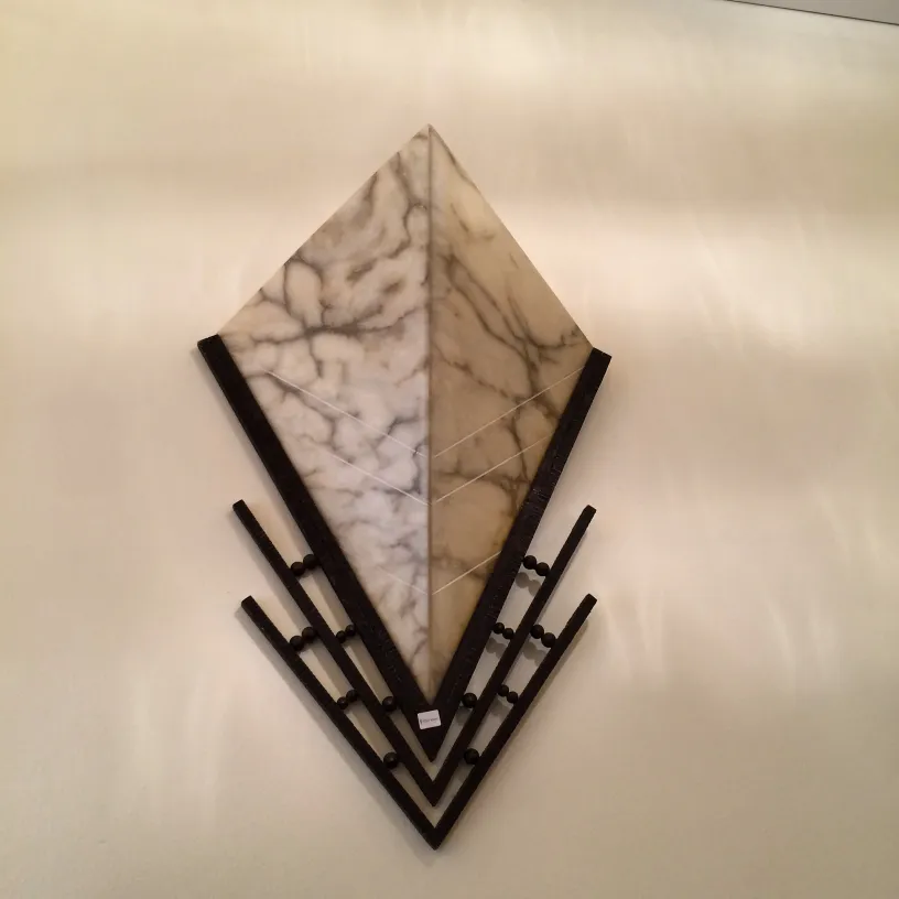 Antique sconces with diamond shape and black details