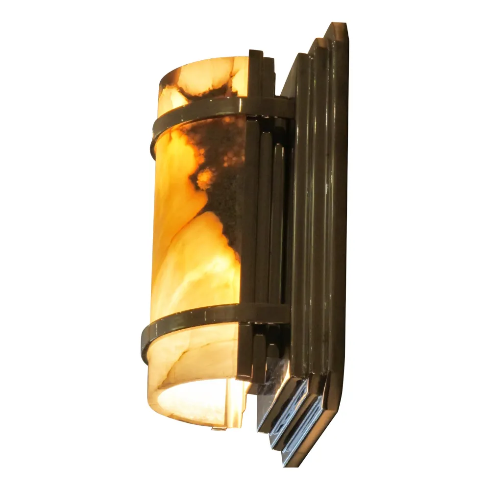 Beautiful antique wall sconces with unique design, glowing.